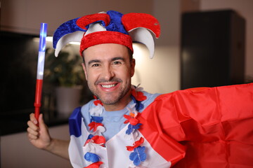 Patriotic French sports fan celebrating a victory