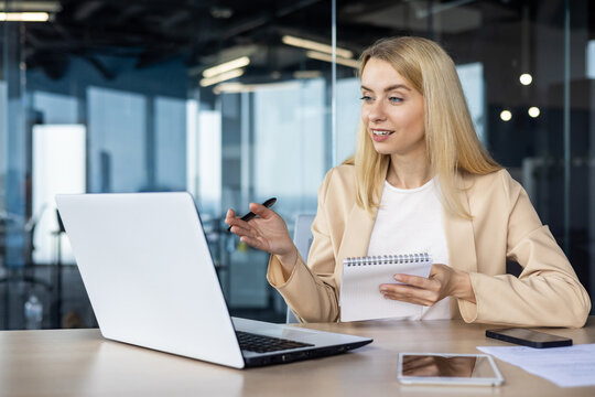 Professional woman giving a presentation in modern office