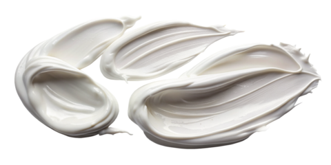 Swirls of white cosmetic cream smears, luxuriously textured and isolated on a transparent background, perfect for beauty and skincare product layouts.