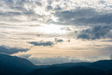 View of mountaine with dramatic sky background.