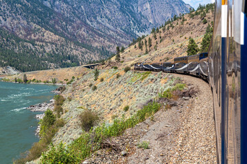 Rocky Mountaineer train along Fraser River, British Columbia, Canada. - obrazy, fototapety, plakaty