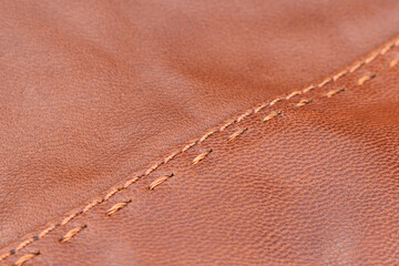 Leather texture background. Part of perforated brown leather details. Perforated leather texture...