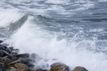 Ocean waves splashing on a rocky shore