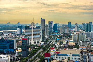 High rise buildings of Bangkok metropolitan cityscape skyline at sunset