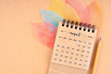 August 2024 monthly desk calendar and fiber structure of dry leaves texture, skeleton leaf.