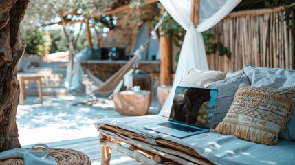 Serene Outdoor Workspace With Laptop and Hammock