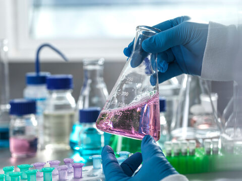 Scientist holding a flask in a laboratory