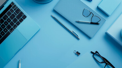 Discover the perfect blend of style and functionality with electronic equipment, pens, and notebooks against a captivating blue background. Elevate your workspace with AI generative designs.