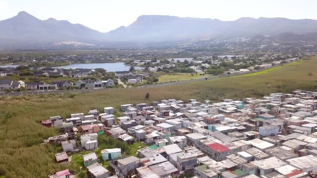 Aerial poor township and rich suburb in South Africa