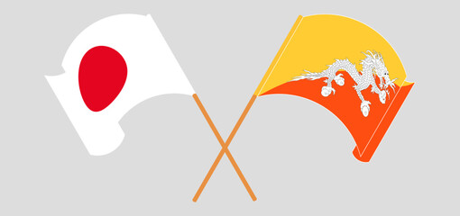 Crossed flags of Japan and Bhutan. Official colors. Correct proportion