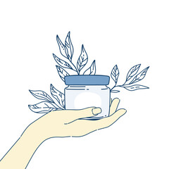 Female hand holding cream. Skincare products. Hand and body cream. Daily skin care routine and hygiene concept