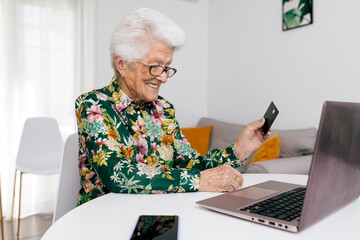 Senior Woman Shopping Online from Home