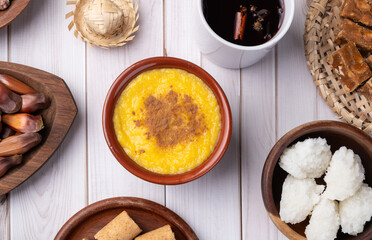 Typical brazilian june festival food over white wooden table. Festa junina