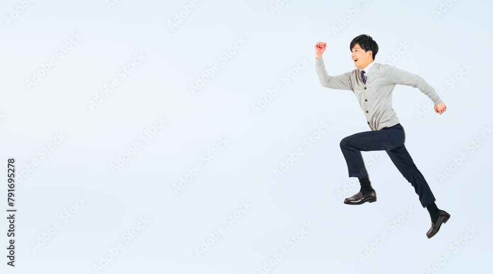 Aufkleber ジャンプする制服を着た男子学生の全身写真（切り抜き背景透過pngも販売しております。作成者リンクから「png」で検索してください）