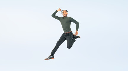 Full body photo of a black man jumping. (We also sell PNGs that are cropped and have transparent...
