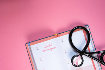 Calendar with schedule mammogram written.  Reminder.  Breast cancer prevention.