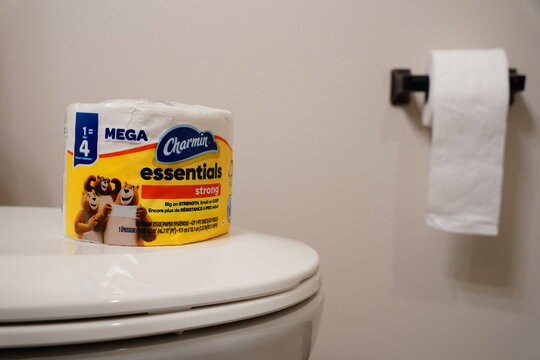 Single roll of Charmin Essentials Strong Mega toilet paper roll. 