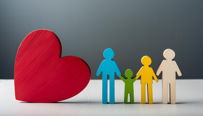 Picture of a family of four in the form of colorful simple wooden figures with a red simple heart figurine on a neutral background