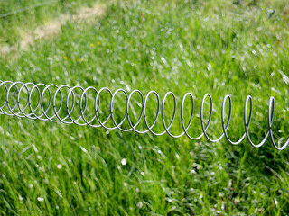 Electrified fence along the borders of land intended for grazing animals
