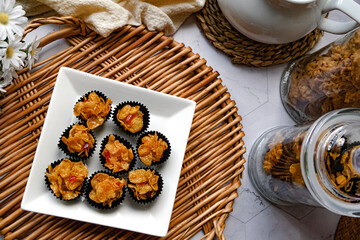 Honey Cornflakes (Cornflakes Madu) a popular cookies in Malaysia during celebration of Eid Mubarak (Hari Raya) on selective focus