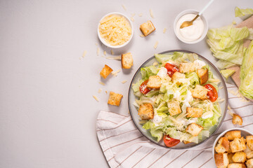 Caesar Salad with Lettuce, Cheese, Cherry Tomatoes and Croutons