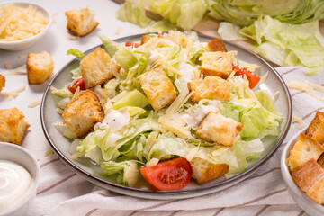 Caesar Salad with Lettuce, Cheese, Cherry Tomatoes and Croutons