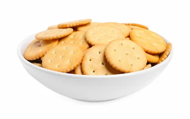 Foto op Plexiglas Tasty crackers in bowl isolated on white © New Africa