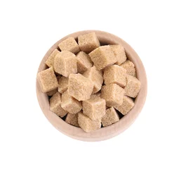Fotobehang Brown sugar cubes in wooden bowl isolated on white, top view © New Africa
