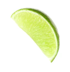 Fotobehang Slice of fresh green ripe lime isolated on white © New Africa