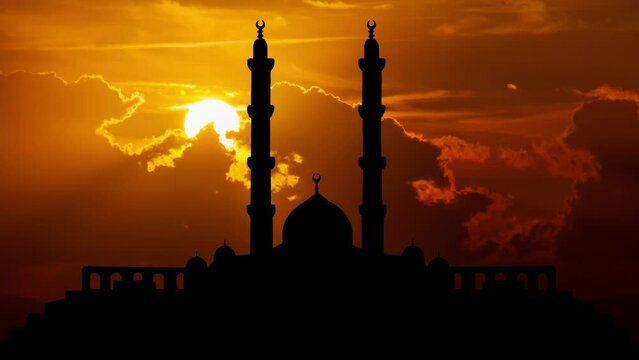 Egypt's Islamic Cultural Center, which houses Masjid Misr or the Grand Mosque, Time Lapse at Sunset with Red Clouds and Fiery Sky