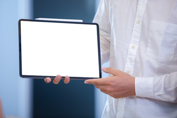 Man showing blank digital tablet isolated white screen. empty mock up copy space display...