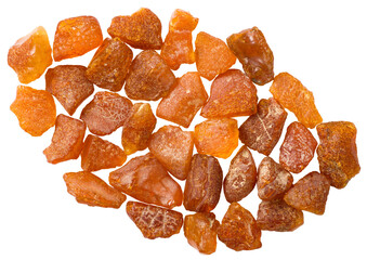 Crushed amber isolated on white background, top view.