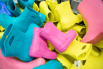  Childlike multi-colored rubber boots in the store