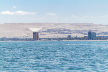 view of the city of Arica, on Chinchorro beach, from the high seas, Pacific Ocean