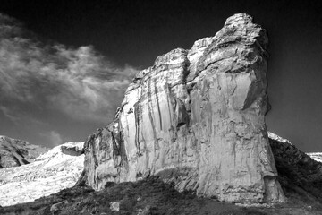Black and white view of the Dramatic, imposing Sandstone cliff known as the Brandwag Buttress in...