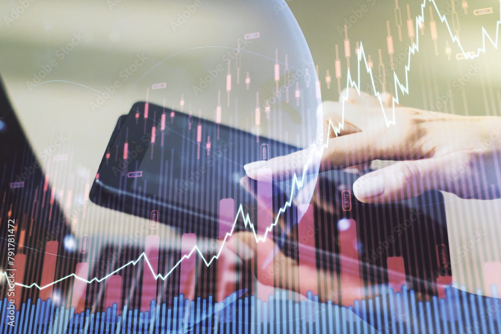 Poster Multi exposure of abstract financial graph with world map and hand working with a digital tablet on background, financial and trading concept