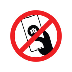 No photography. No photography or video sign, phone in hand with camera on.