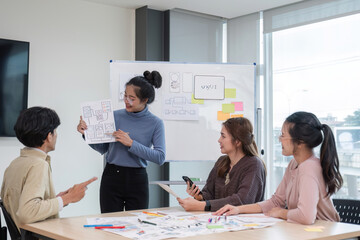 Brainstorming session for the creative team of designers in application design and implementation planning ux ui Teamwork of modern business teams