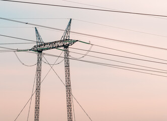 Electricity pylon transmission towers and electrical wires - 791785275