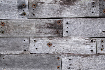 Wooden planks with rusted holes texture
