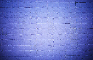 Purple titles wall on city street background
