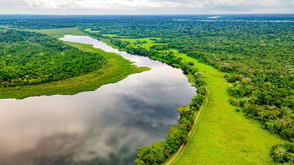 Aerial view of Laguna Negra amidst lush greenery in San Jose del Guaviare, Colombia