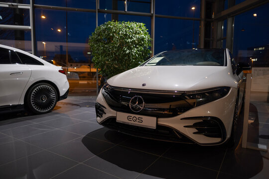 new white electric Mercedes-Benz EQS 580 4matic, car in showroom, Mercedes-Benz Group, environmental cleanliness vehicle, Innovation in automotive industry show Frankfurt, Germany - January 25, 2024