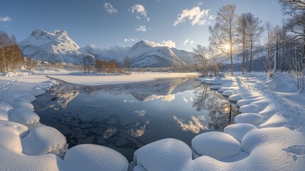 A beautiful winter landscape with snow-covered mountains, trees, and a frozen lake.