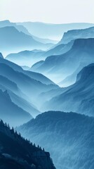 Fototapeta premium Serene Blue Mountain Range Fading into Misty Sky