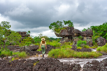 Woman exploring the tunnel nature reserve in San José del Guaviare, Colombia