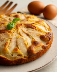 Sponge cake with pear and yogurt. Delicious traditional Italian recipe.