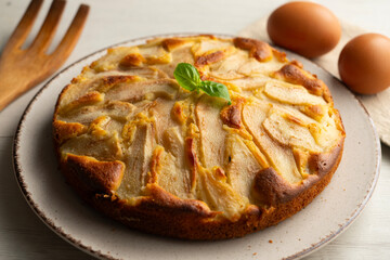 Sponge cake with pear and yogurt. Delicious traditional Italian recipe.