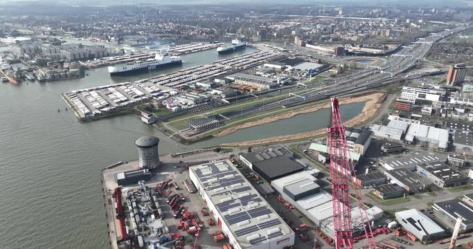 Schiedam, Zuid Holland, The Netherlands, March 9th, 2024: The Benelux tunnel and the A4 motorway between Schiedam and Pernis, highlighting the infrastructure in the Netherlands. Aerial drone view.