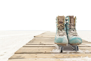 A pair of skates placed on a wooden boardwalk, beckoning boys and girls to venture onto the sandy beach for an exhilarating summer skating experience, isolated on a solid white background.